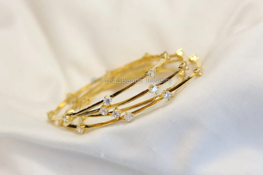 Gold Solitaire CZ Bangle Set ( Set of 4)